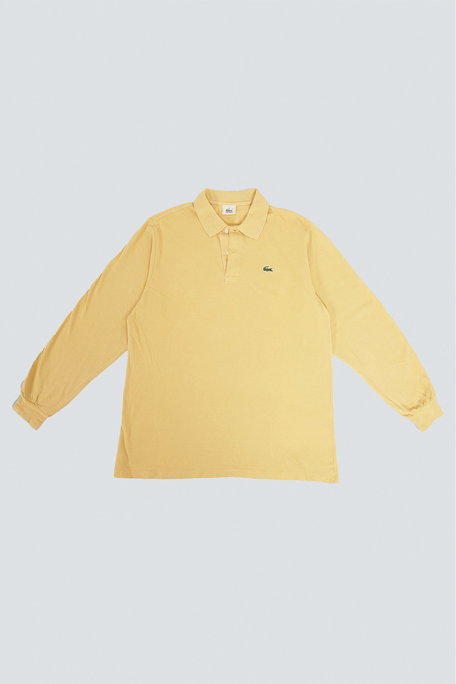 POLO LACOSTE AMARILLO