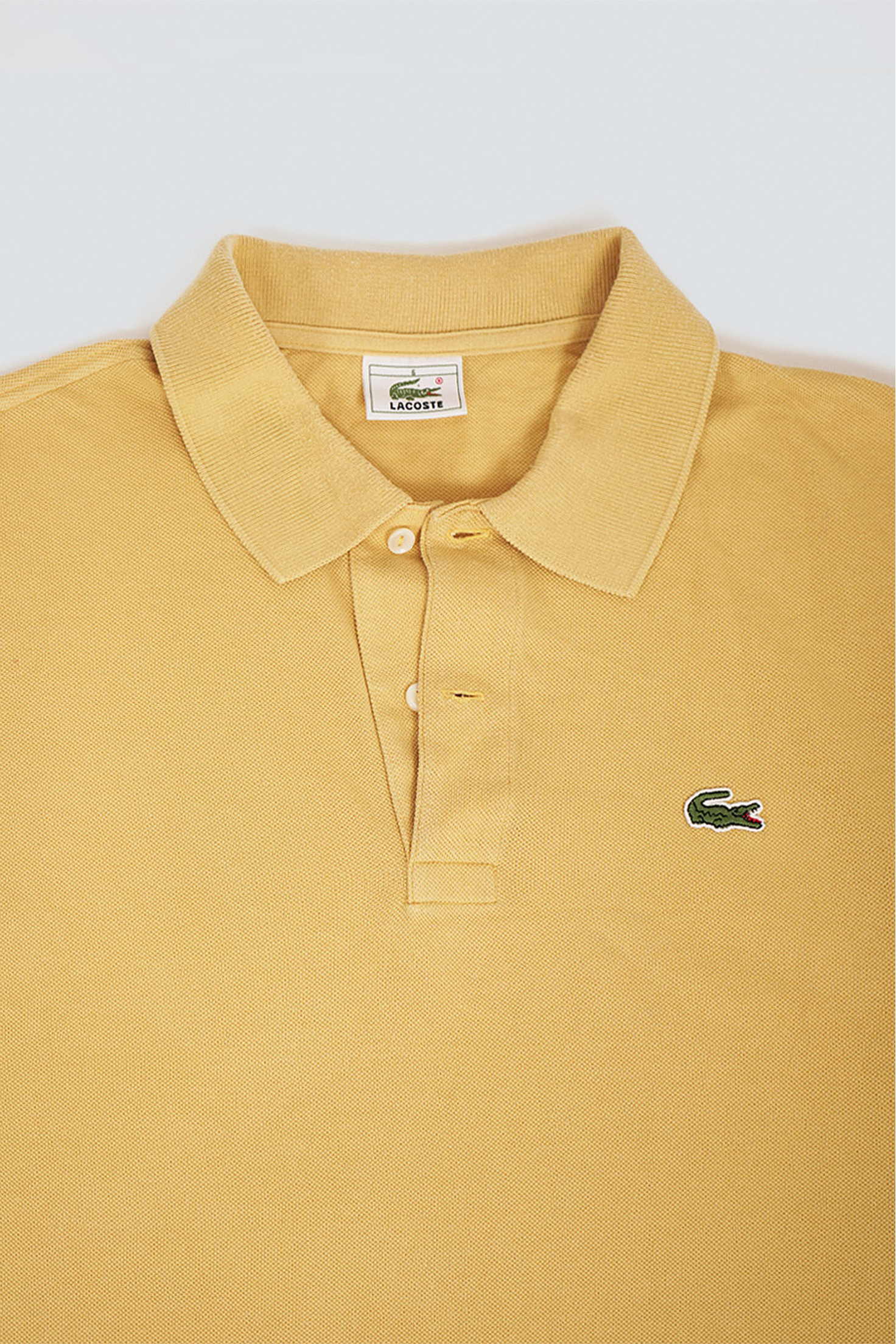 POLO LACOSTE AMARILLO