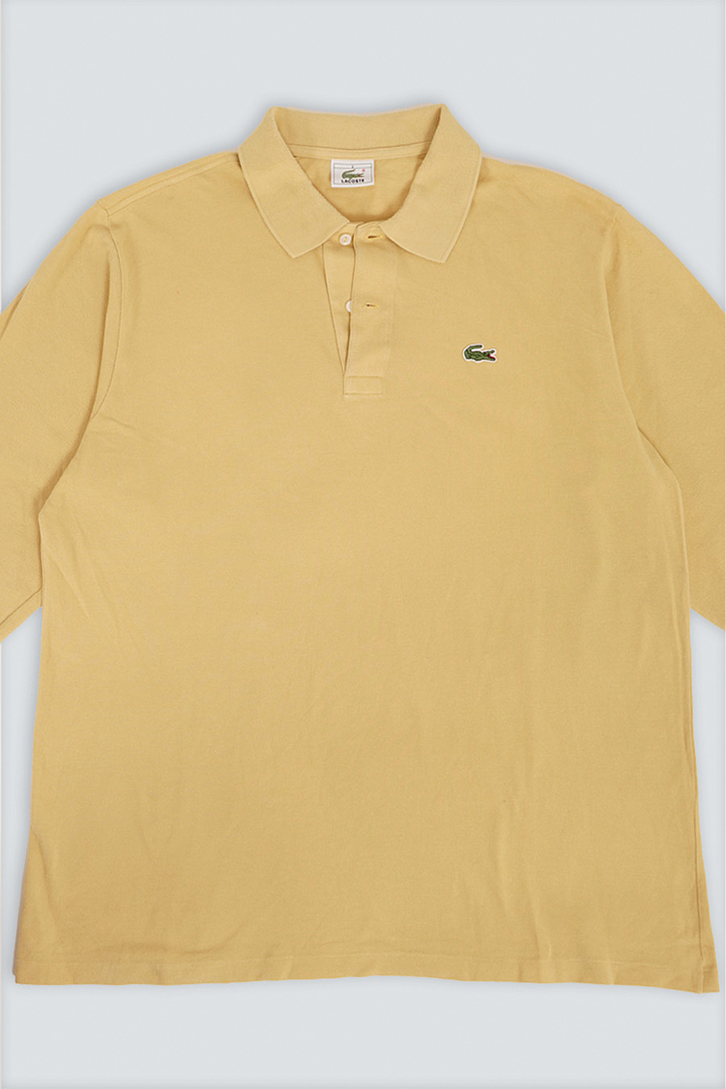 POLO LACOSTE AMARILLO