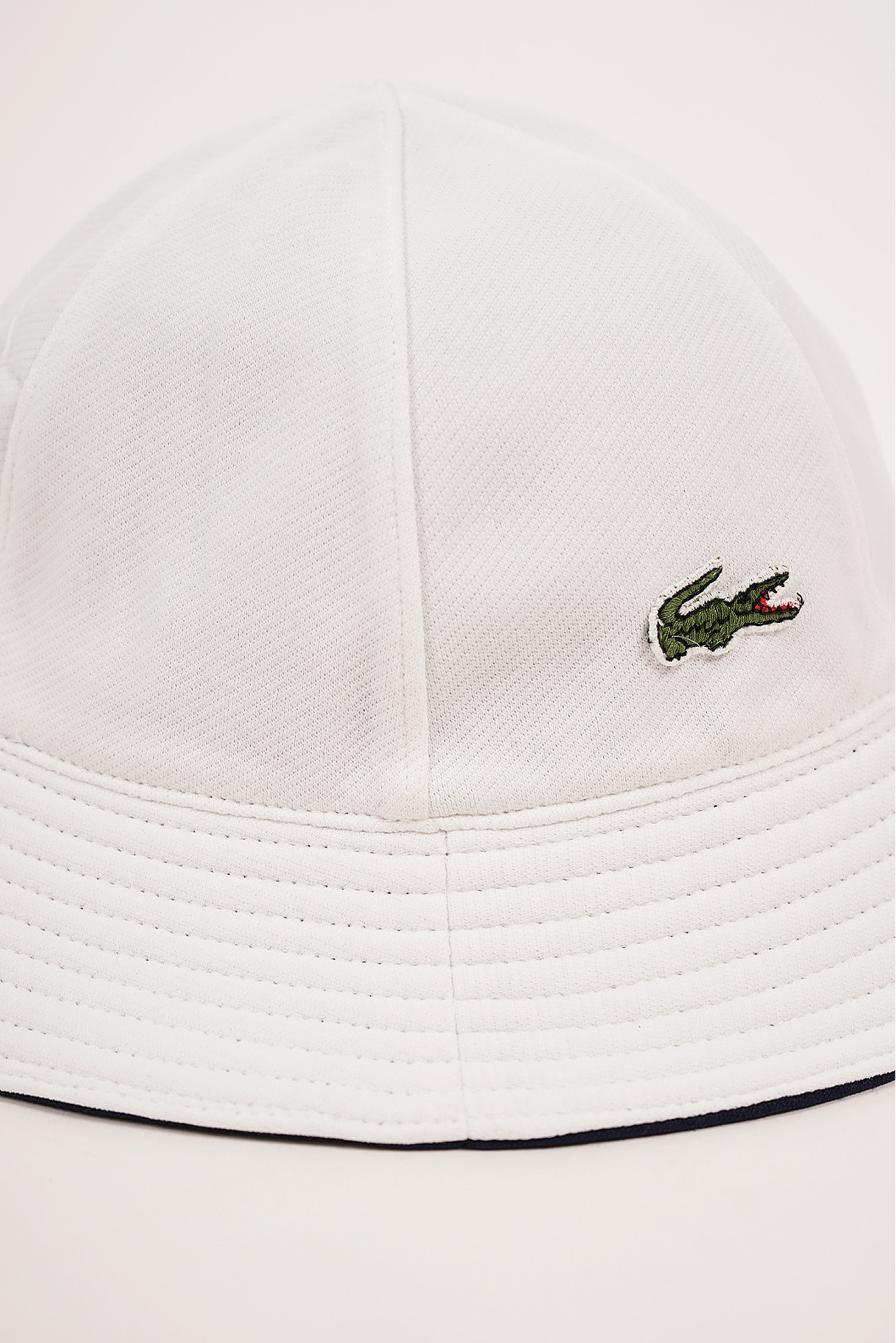SOMBRERO REVERSIBLE BUCKET LACOSTE