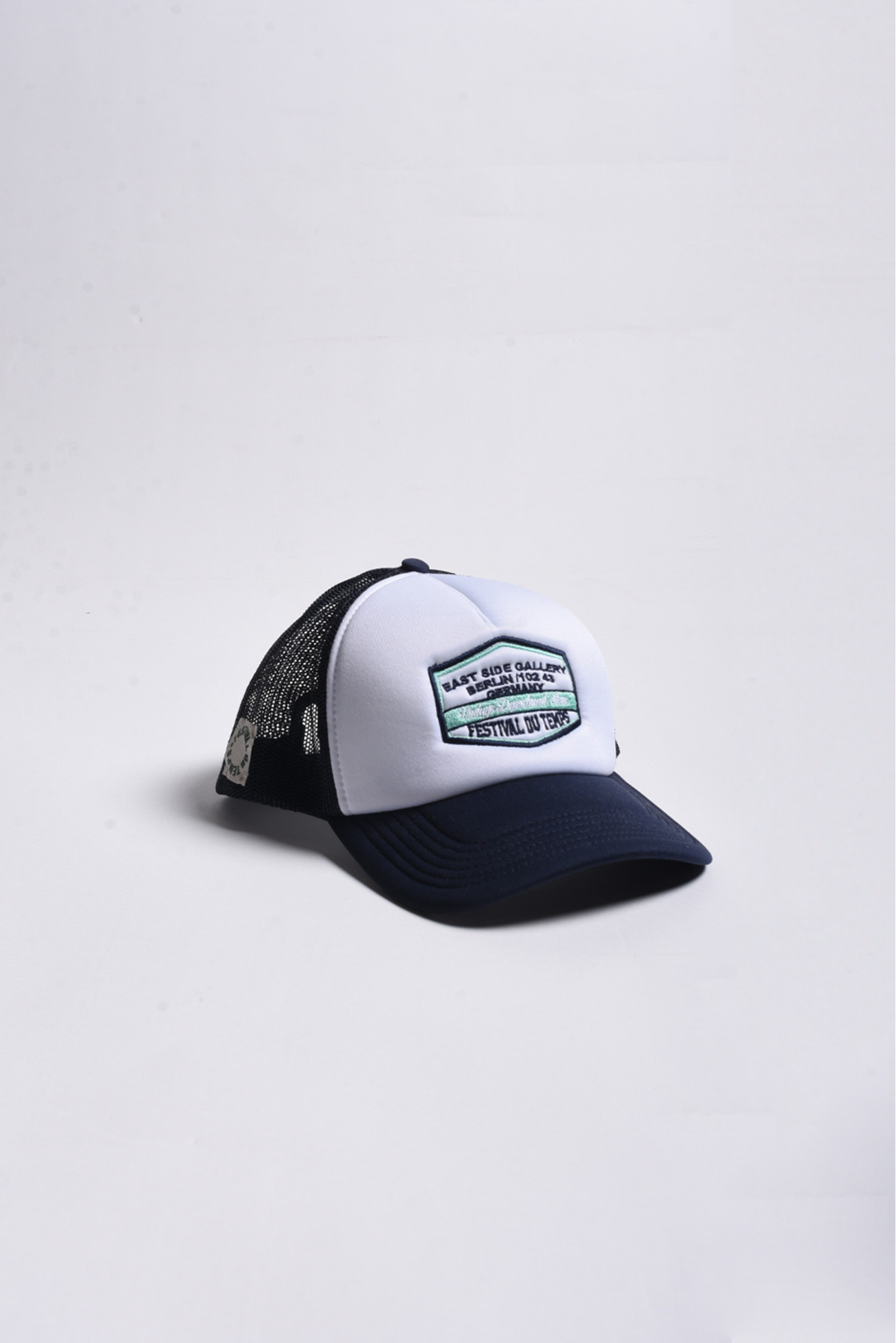 GORRA TRUCKER BLANCA EAST GALLERY TURQUESA